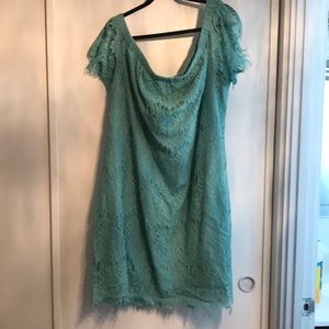 Plus size off the shoulder lace dress.
